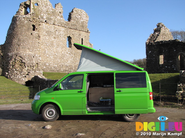 SX12392 Our green VW T5 campervan with popup roof at Ogmore Castle